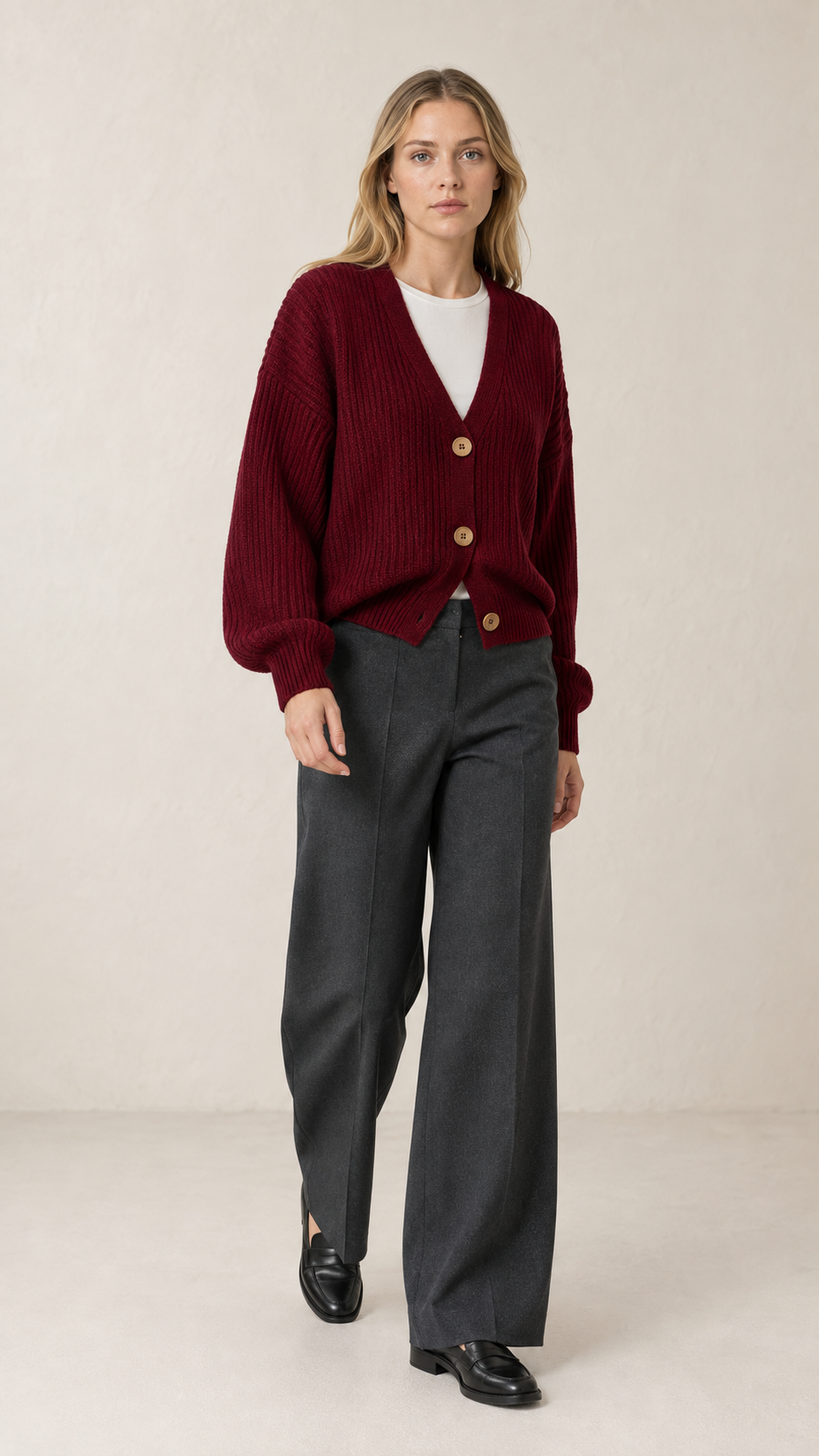 NAMOY model wearing a burgundy rib-knit cardigan